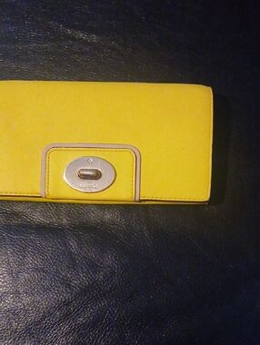 kate spade Yellow Leather Turnlock Continental Wallet